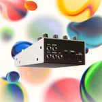 Clear view of the back side of the Hologram Electronics Chroma Console multi-effect pedal showing the inputs and outputs